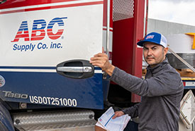 Delivery Driver getting into an ABC Supply Truck